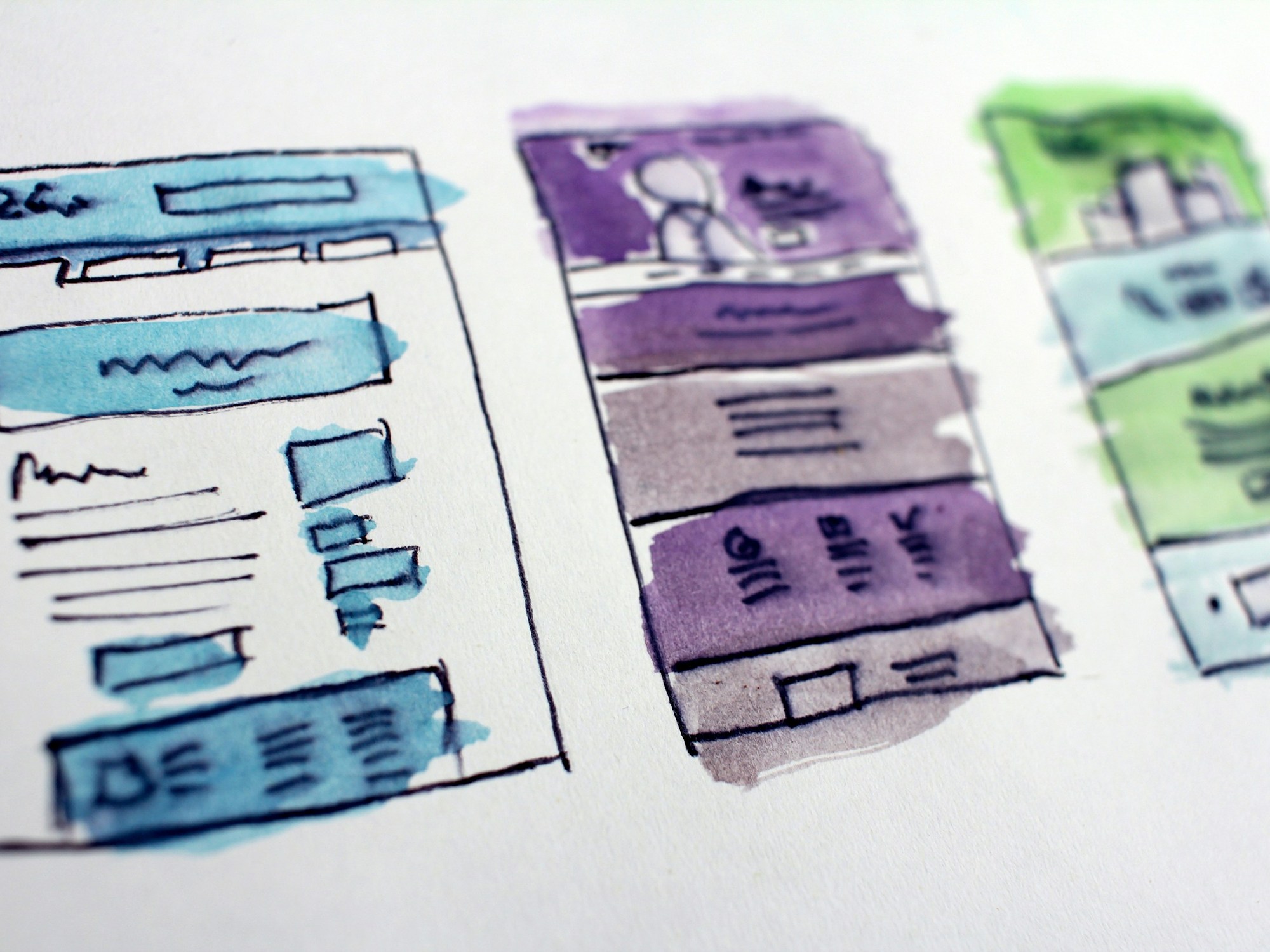 Hand-drawn website wireframes